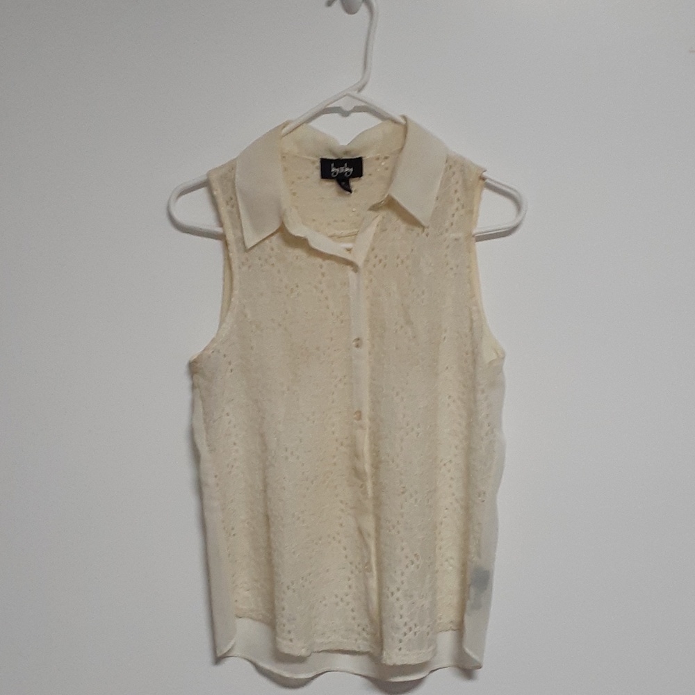 Sleeveless shirt cream
